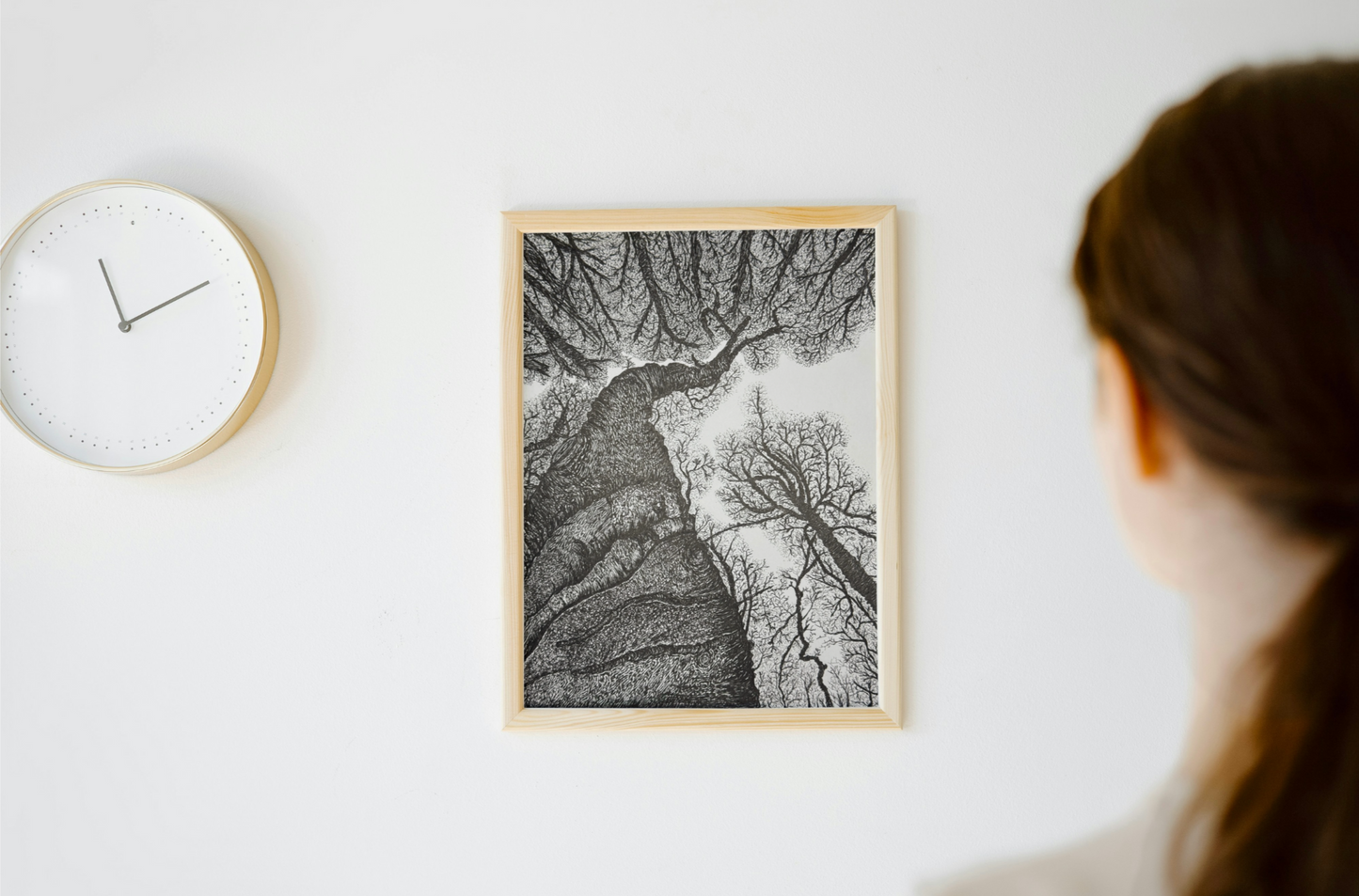Intricate black and white pen drawing of trees viewed from below