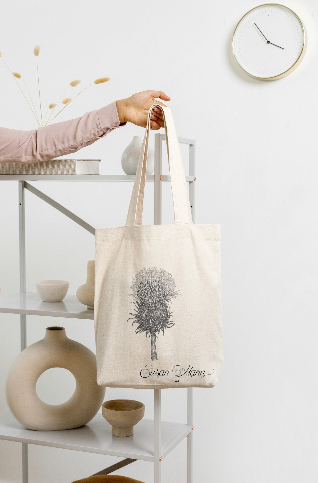 Black and White Thistle Tote Bag being held