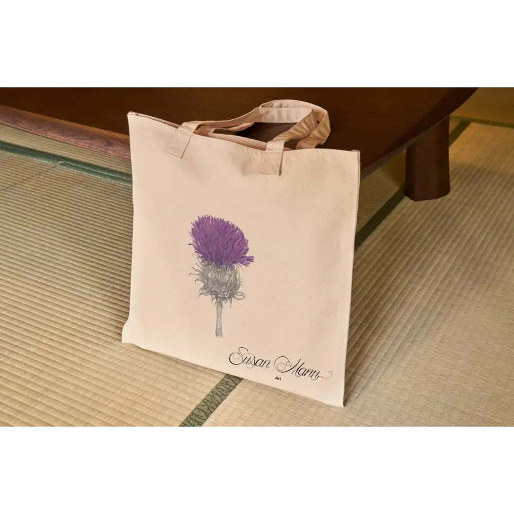 Purple Thistle Tote Bag Against Table