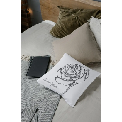 White Rose Cushion on bed